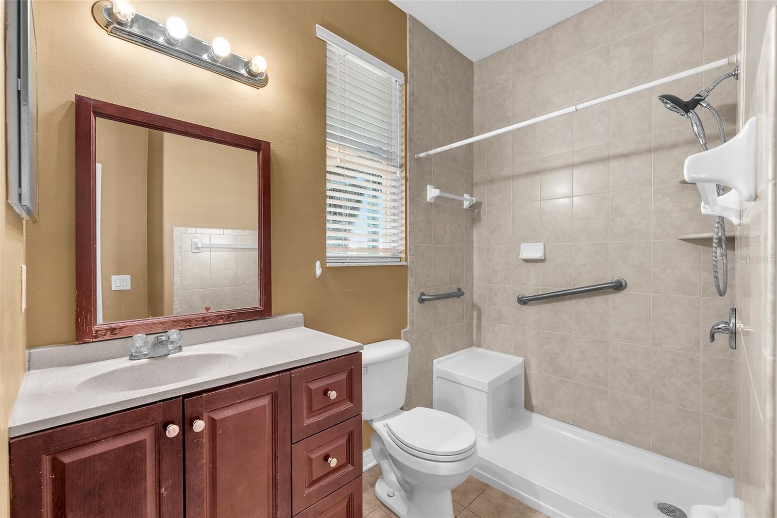 First floor full ADA compliant bathroom adjacent the first floor bedroom with walk-in closet making this a perfect guest area or multi-generation living.