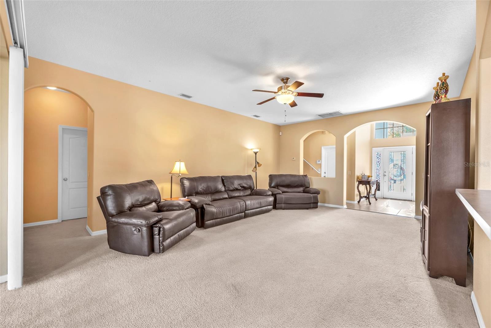 Family room open to the kitchen making entertaining a breeze.