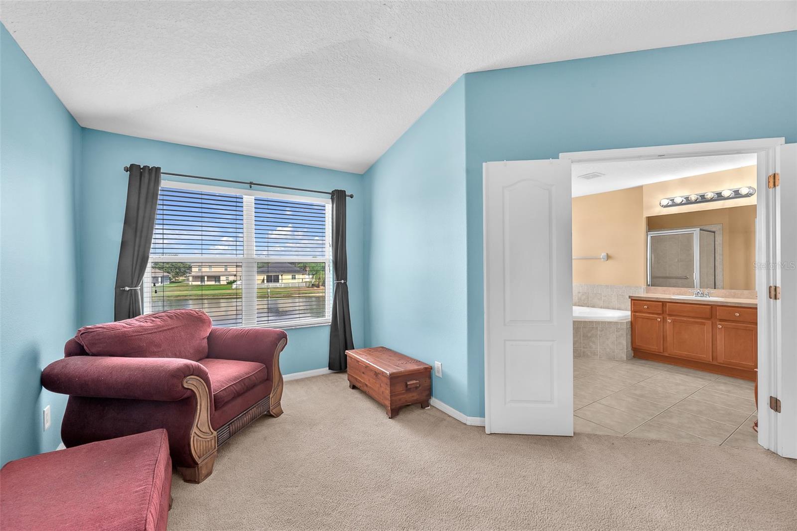 The oversized main suite offers plenty of room for a sitting area