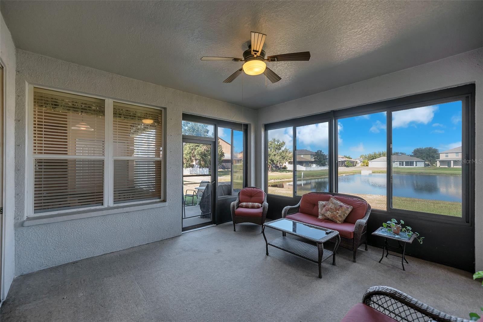 Fully glassed-in Florida Room, featuring double-pane sliding windows with screens.