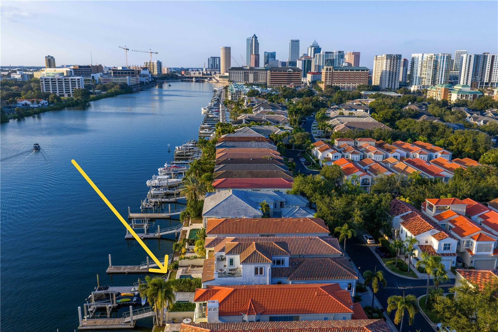 Harbour Island's 24-hour guarded gates ensure serenity, yet you're mere steps from Tampa's vibrant Riverwalk, Bayshore Boulevard, Water Street, and more