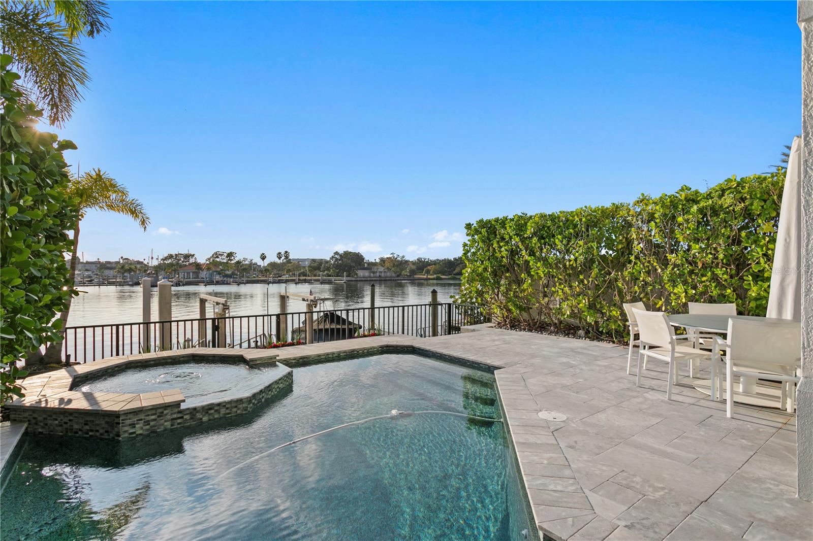 Relax in your private pool while taking in the peaceful views of passing boats
