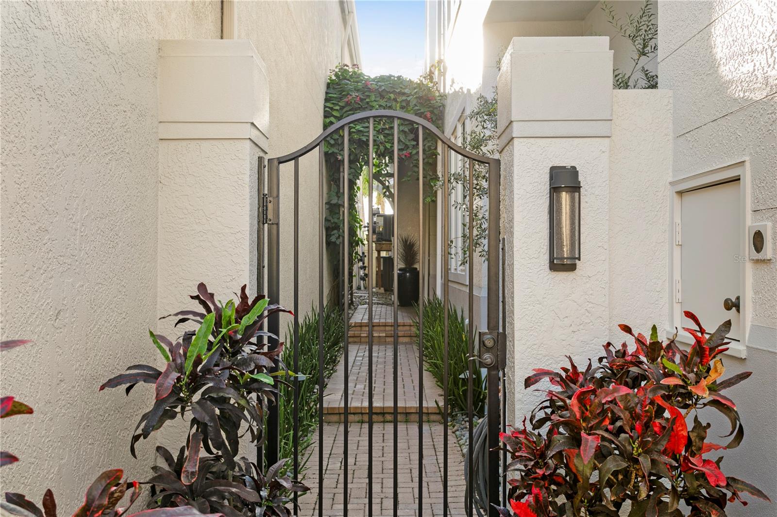 Private gated entry to your front door . . . . step in and take a peek