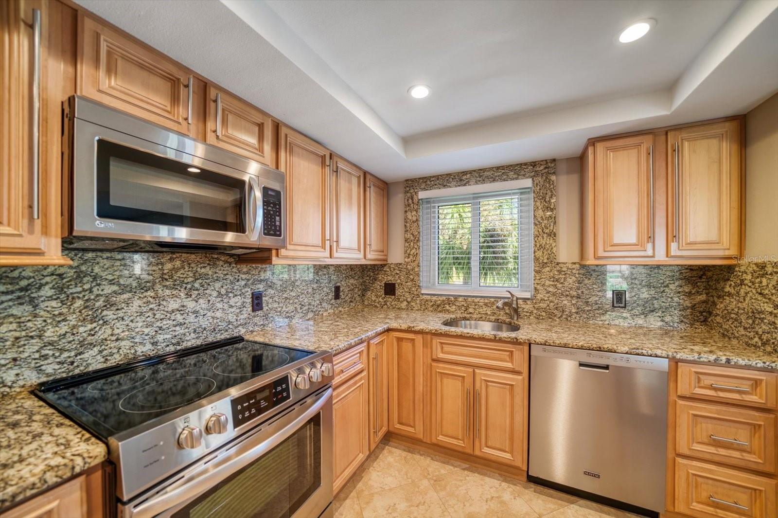 Kitchen with newer stainless steel appliances
