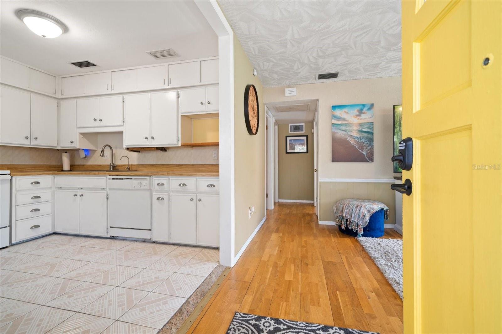 Entry into open kitchen and living room