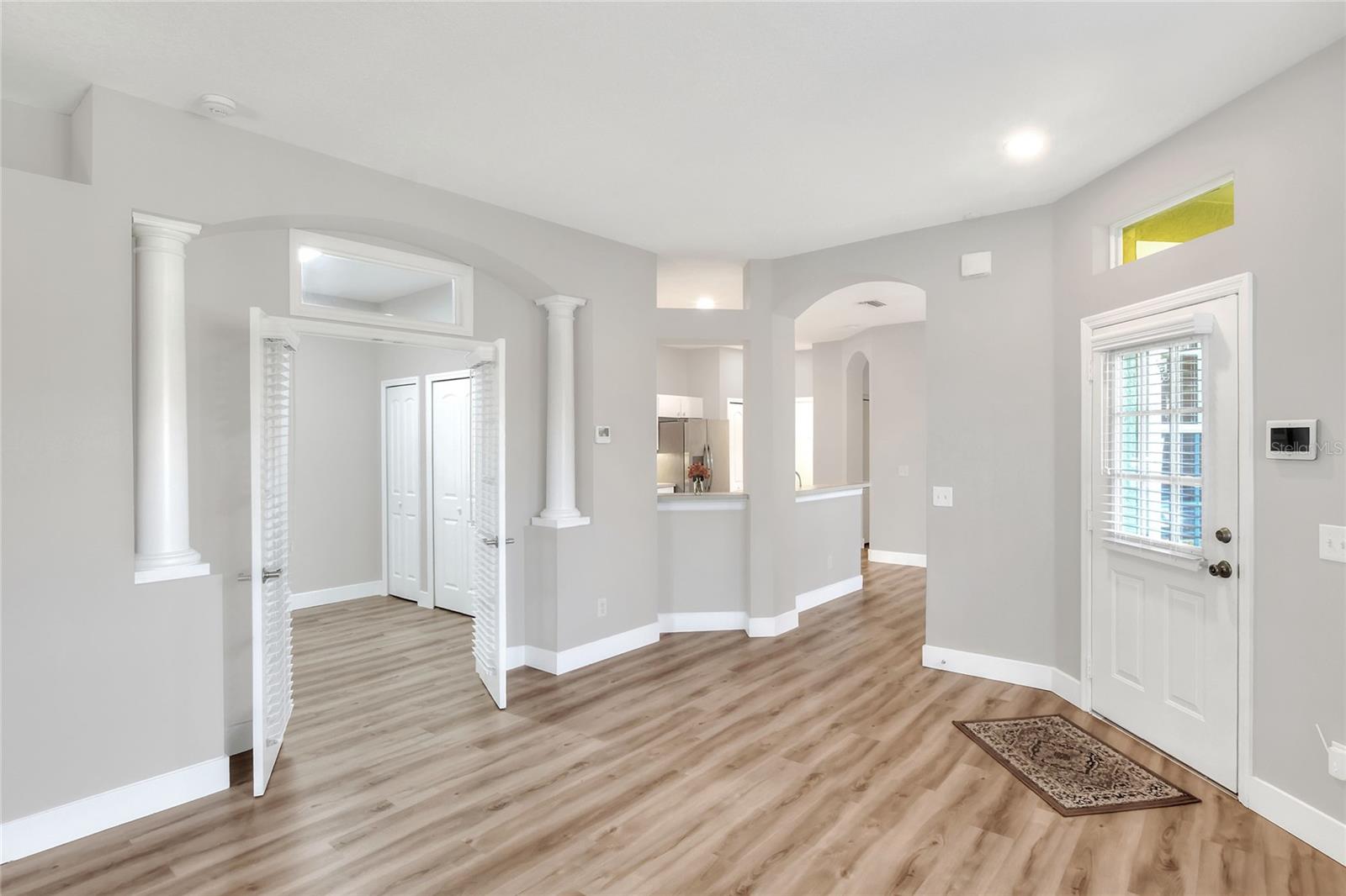 View of office and dining room from living room
