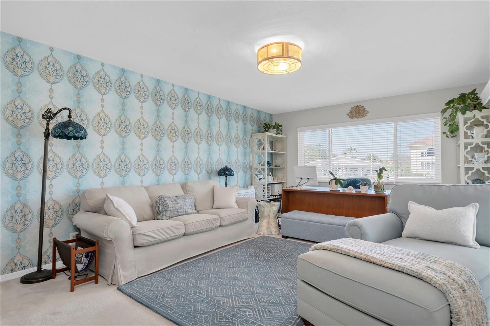 Downstairs primary bedroom currently used as a family room