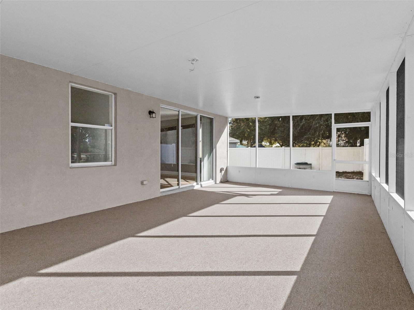 Outdoor patio to fenced side yard