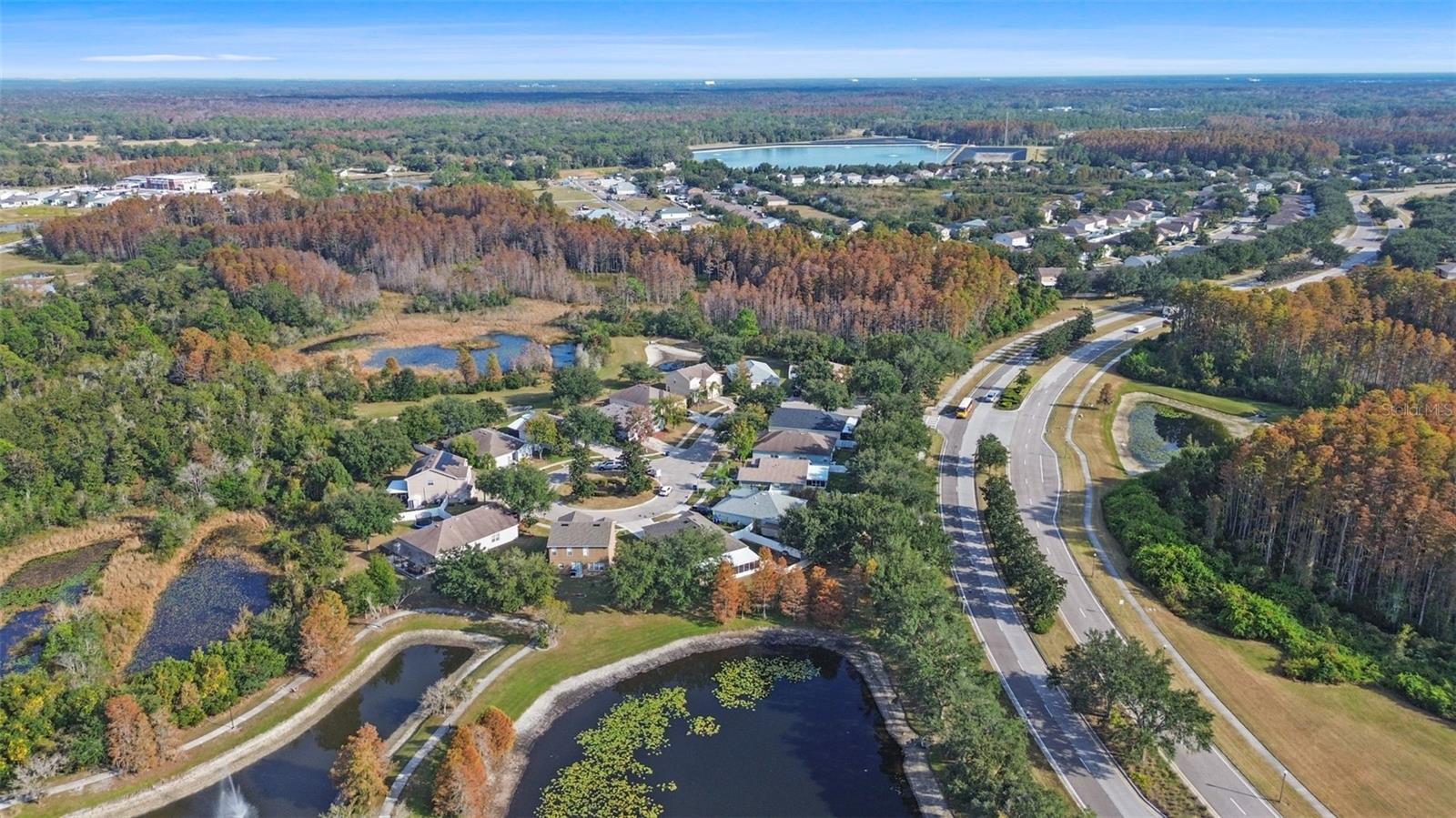 view of the back of the home and Dupree Lakes Drive