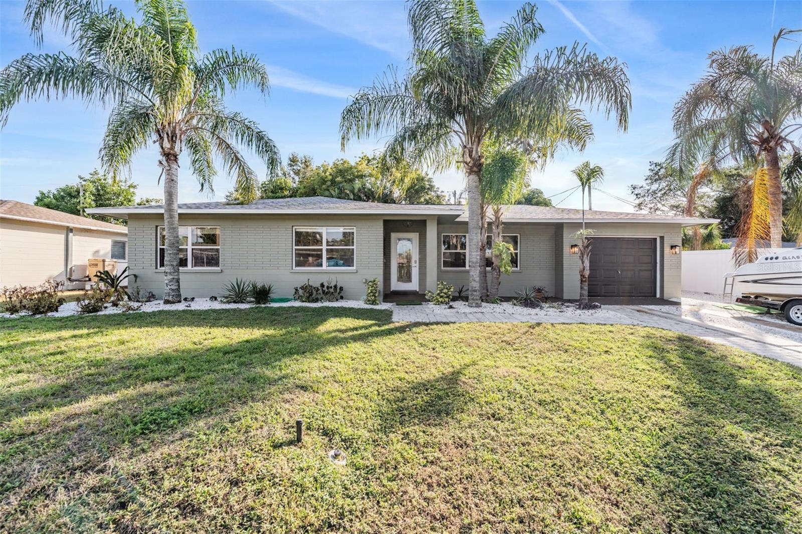 Exterior with tropical landscaping