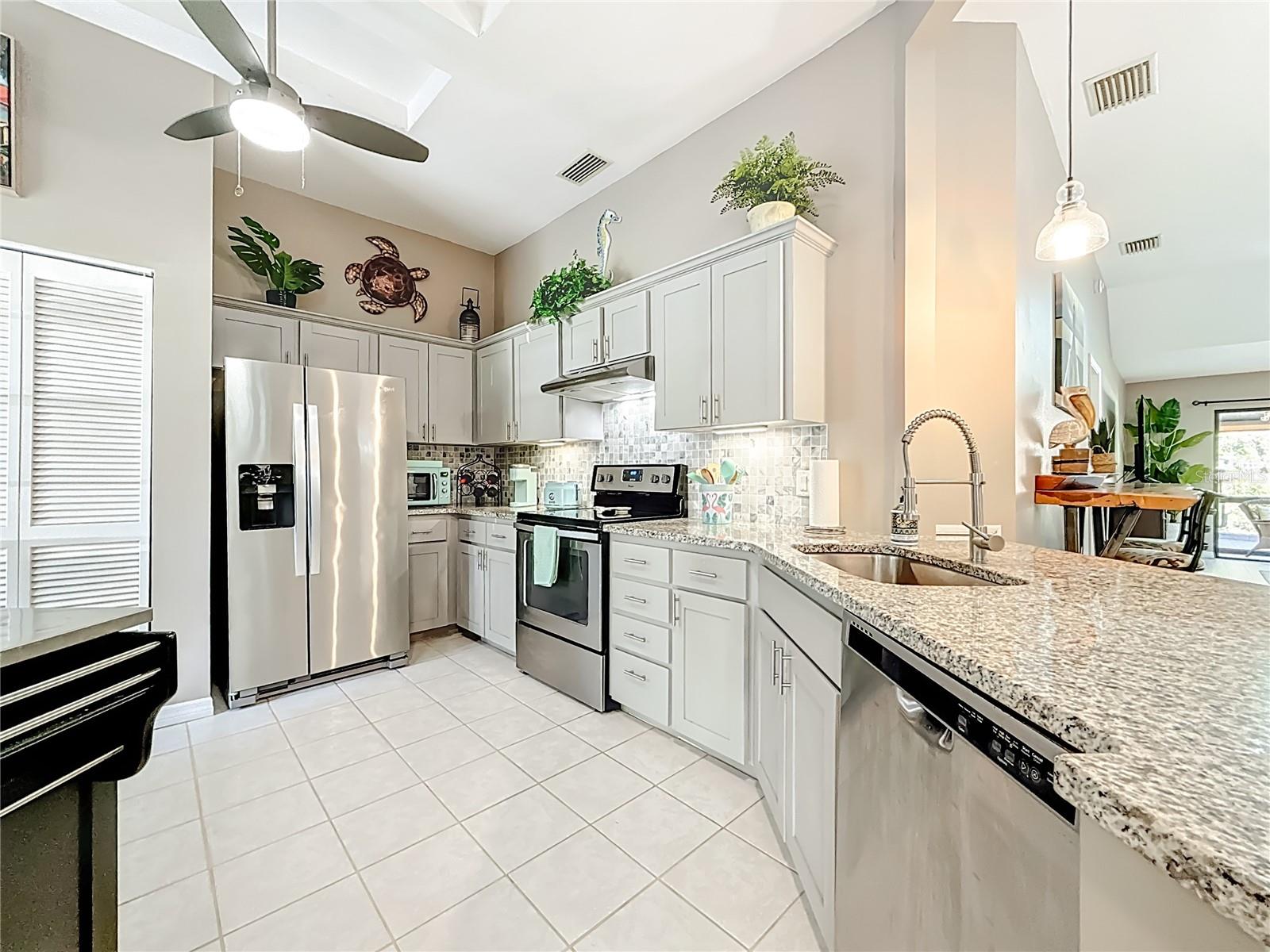 Granite Countertops and Tile Backsplash