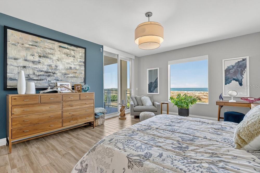 Primary bedroom with beach views.