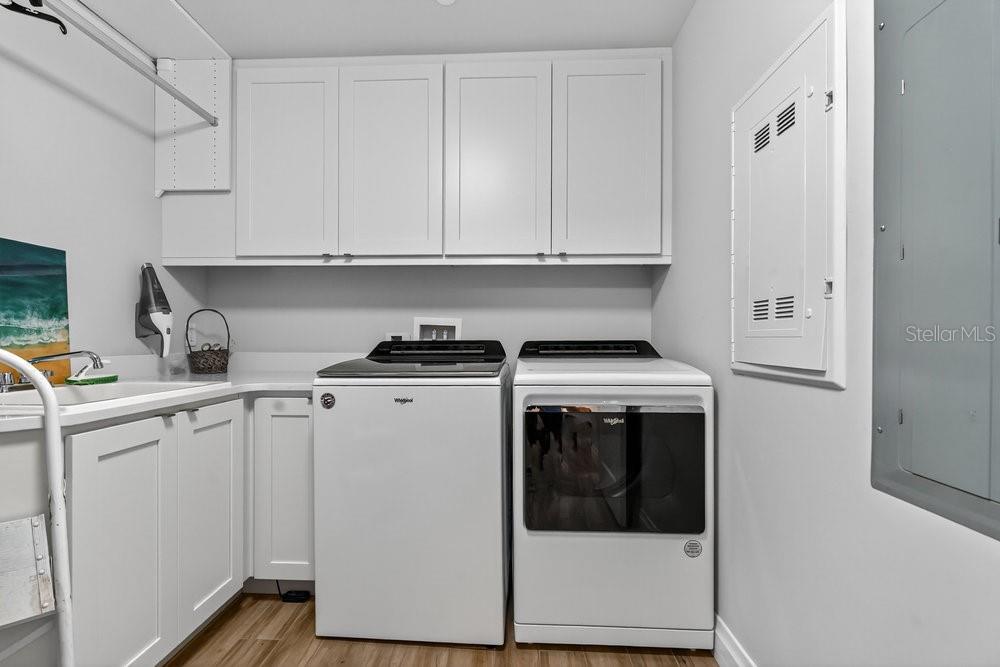 Laundry room with sink.