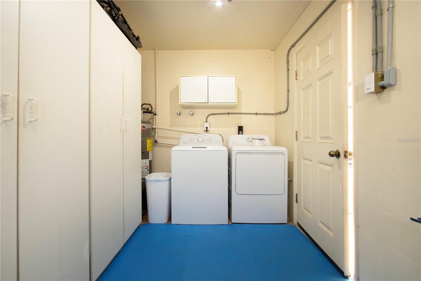 Laundry Room with nice storage