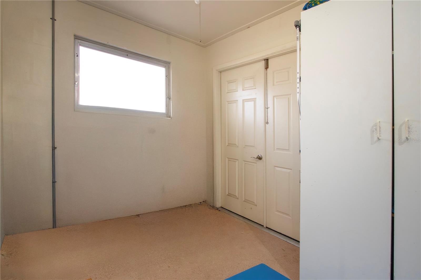 Double doors can accommodate a golf cart storage area