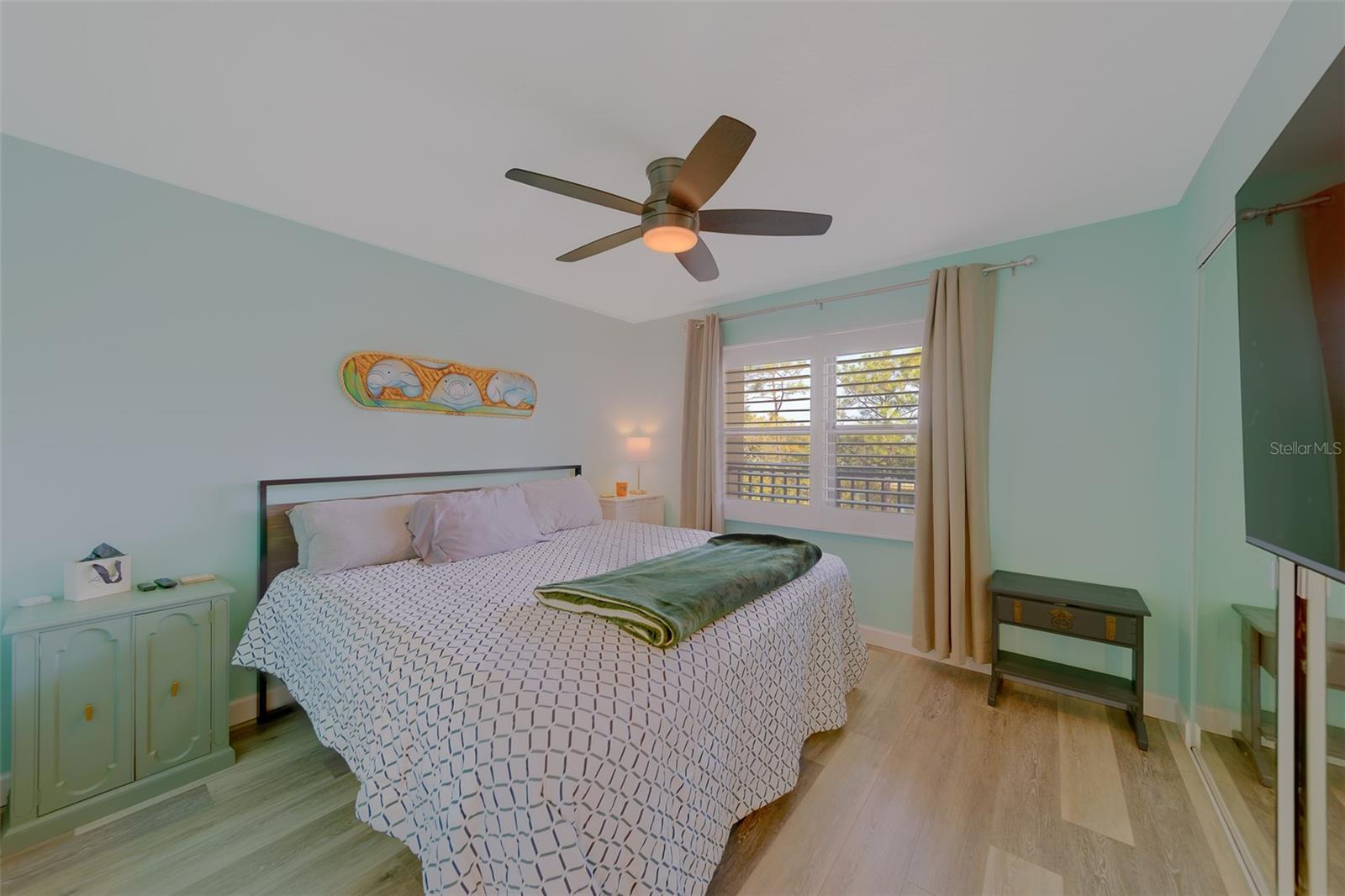 Bedroom 2 features plantation shutters