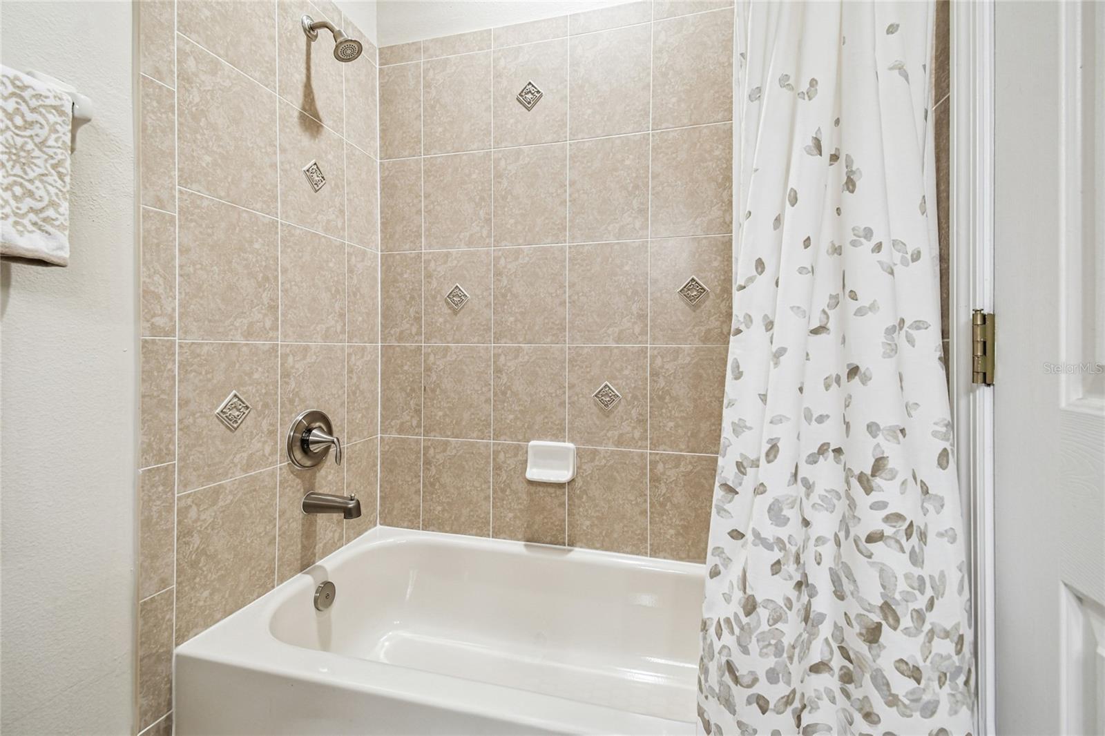 First level bathroom with tub/shower.