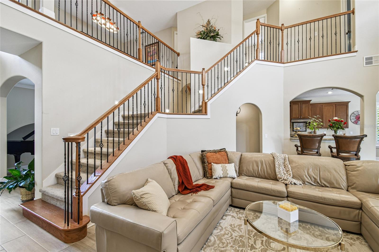 Lower family room with double entry staircase.