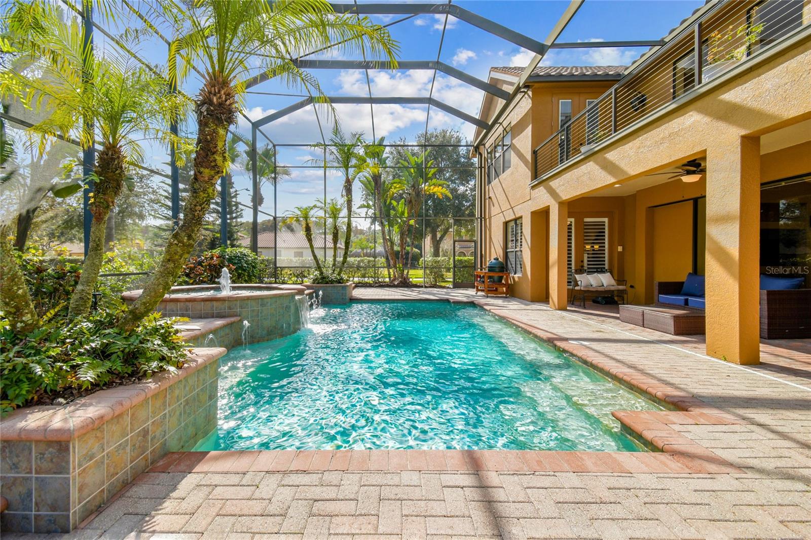 Resort style pool area and outdoor living space