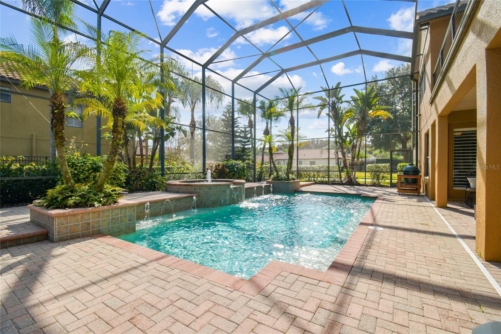 Resort style pool area and outdoor living space