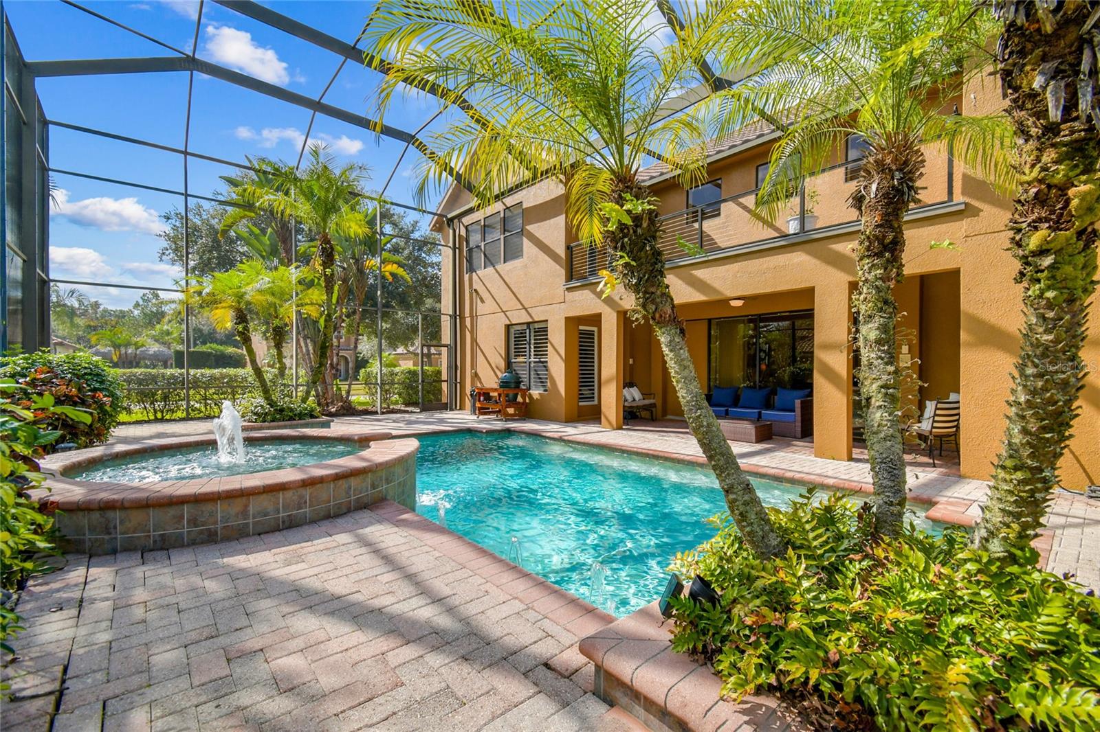 Resort style pool area and outdoor living space