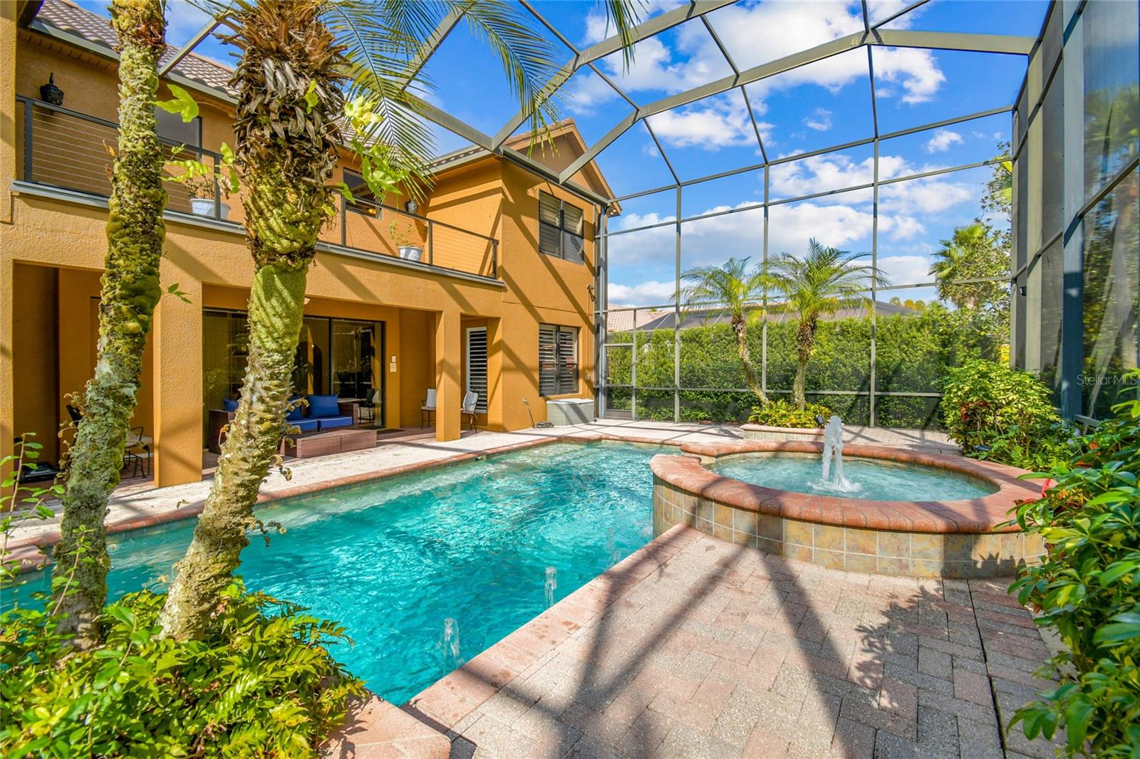Resort style pool area and outdoor living space