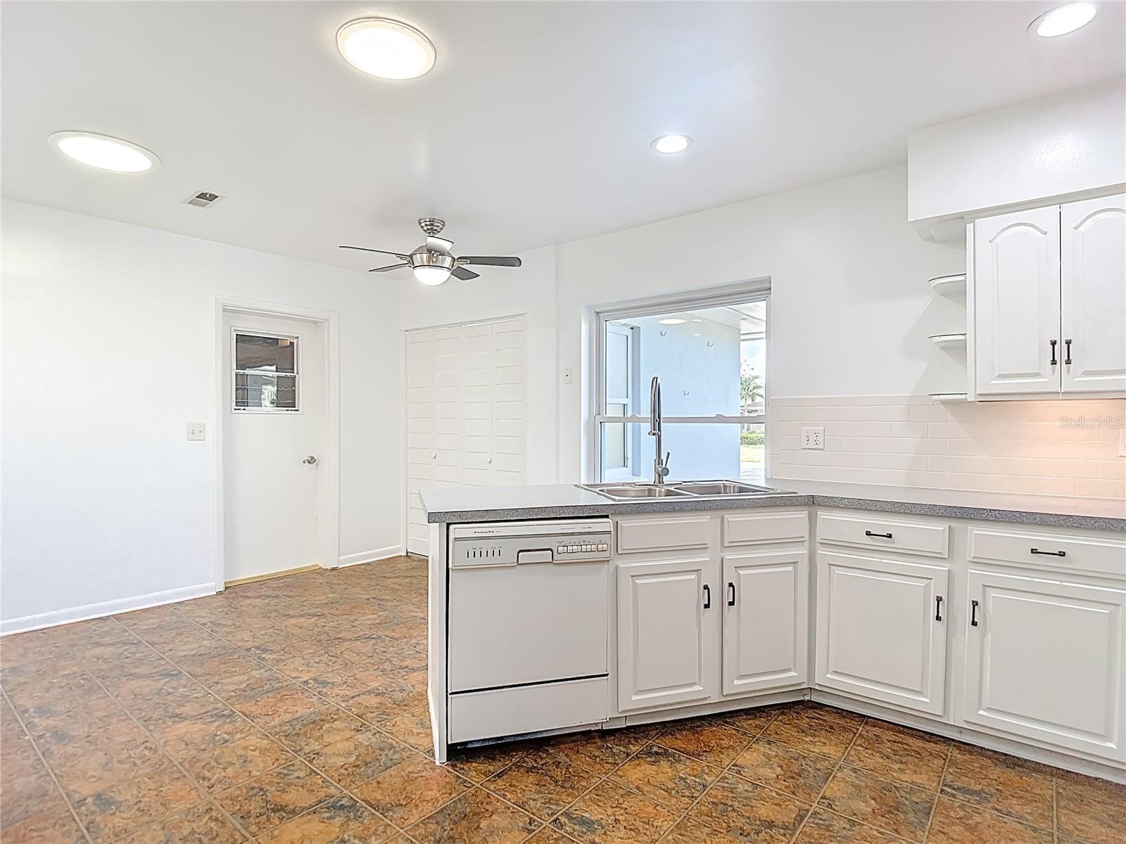 Kitchen - Eating Space - Laundry Closet - Garage Access