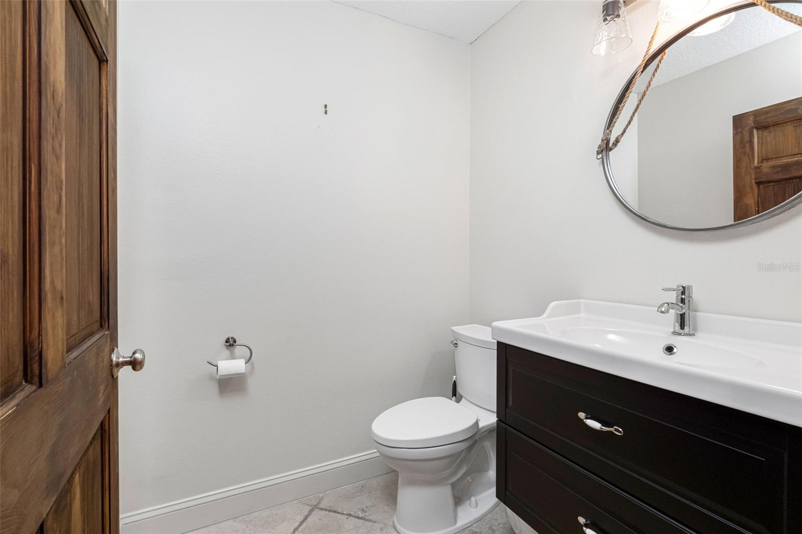 Main home half bath off of Family room