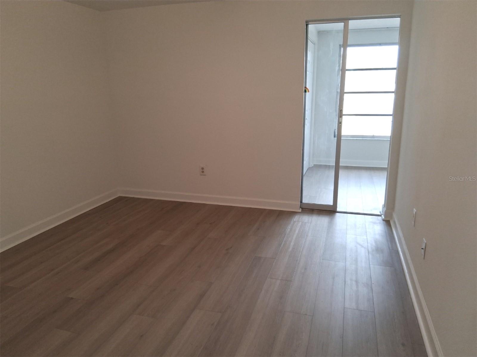 Master bedroom with slider to study/den