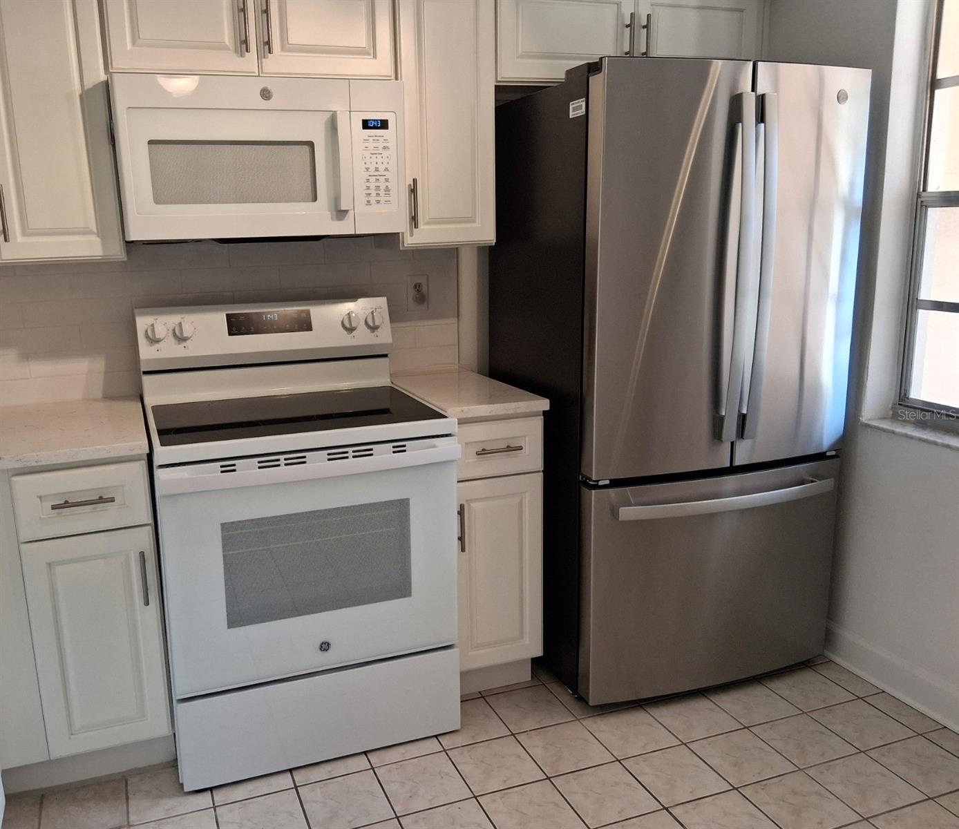 Stainless steel-finish refrigerator will be changed out with white when available