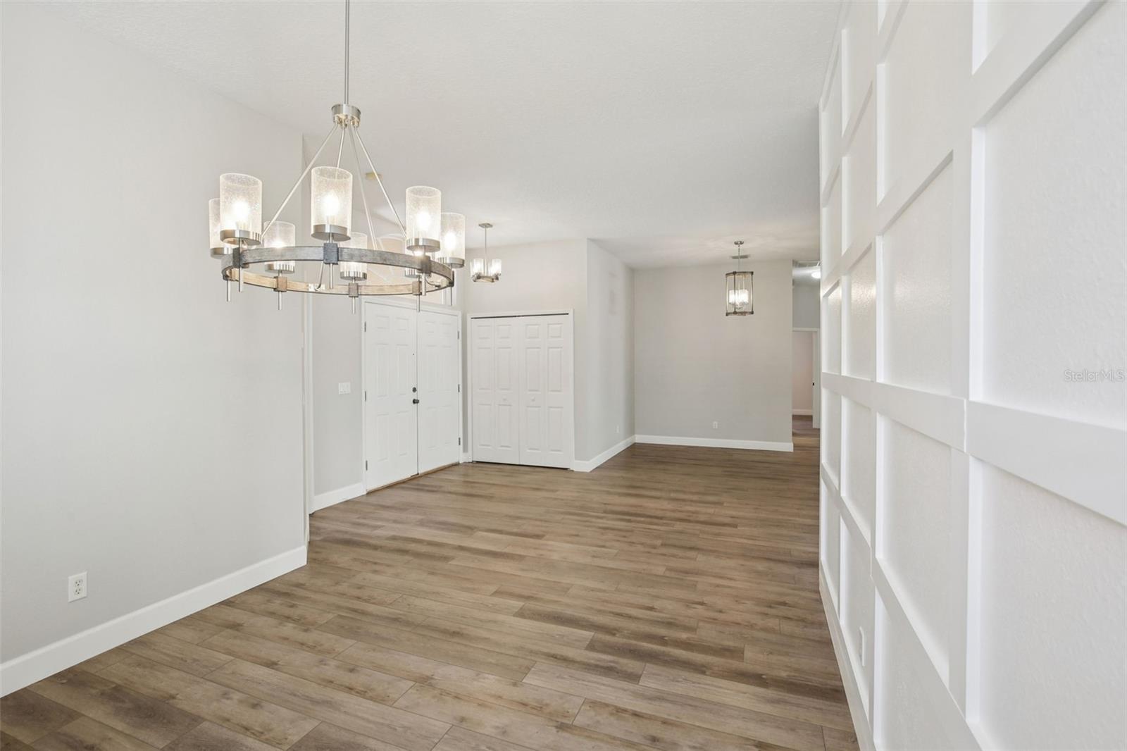 FORMAL DINING ROOM WITH CUSTOM ACCENT WALL