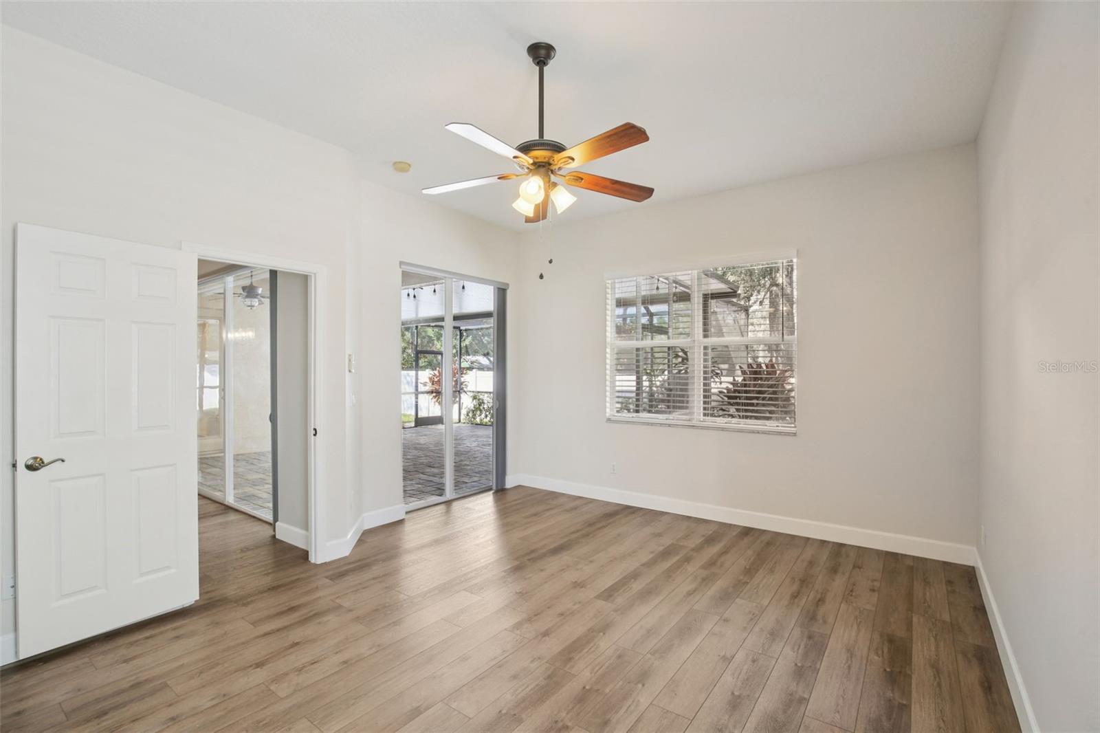 PRIMARY BEDROOM WITH ACCESS TO THE LANAI
