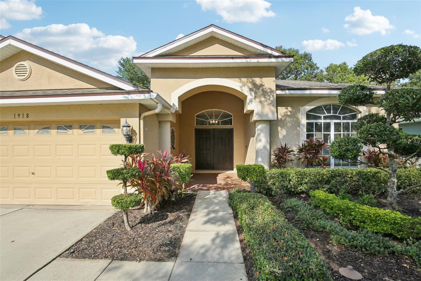 BEAUTIFULLY MAINTAINED  LANDSCAPING