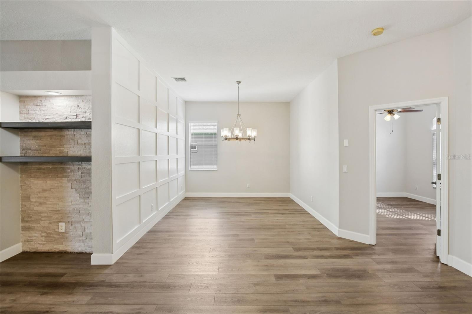 FORMAL DINING ROOM WITH CUSTOM ACCENT WALL