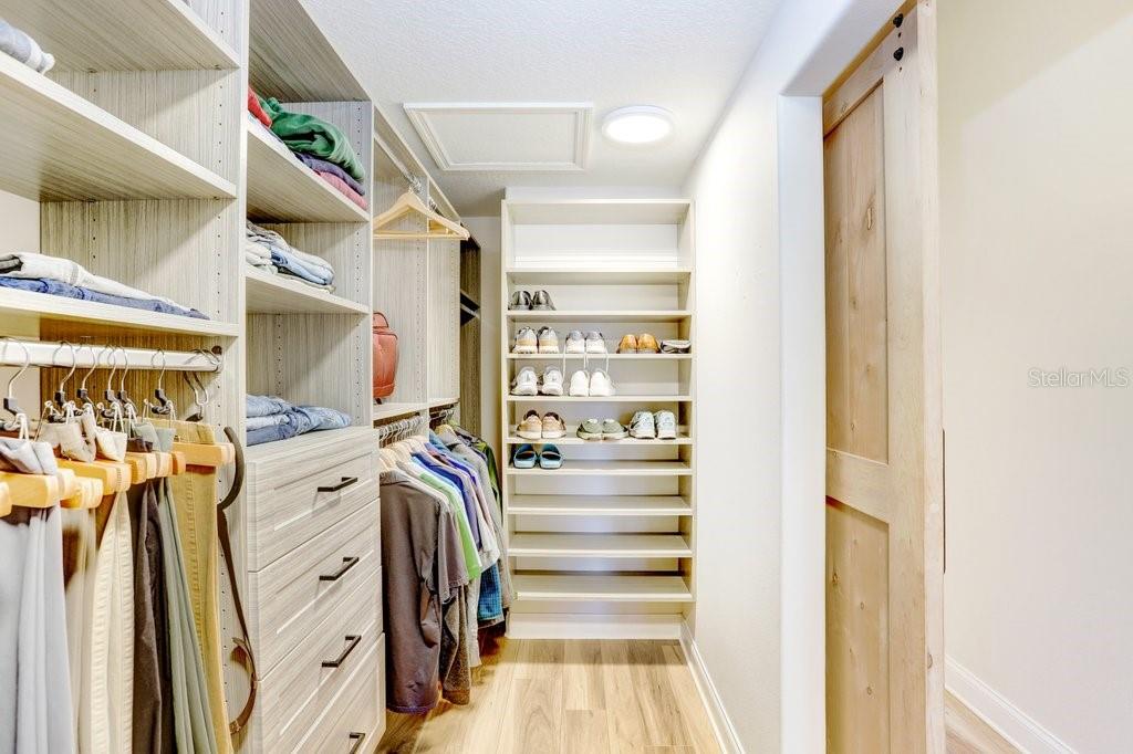 Primary Walk in Closet With Built ins