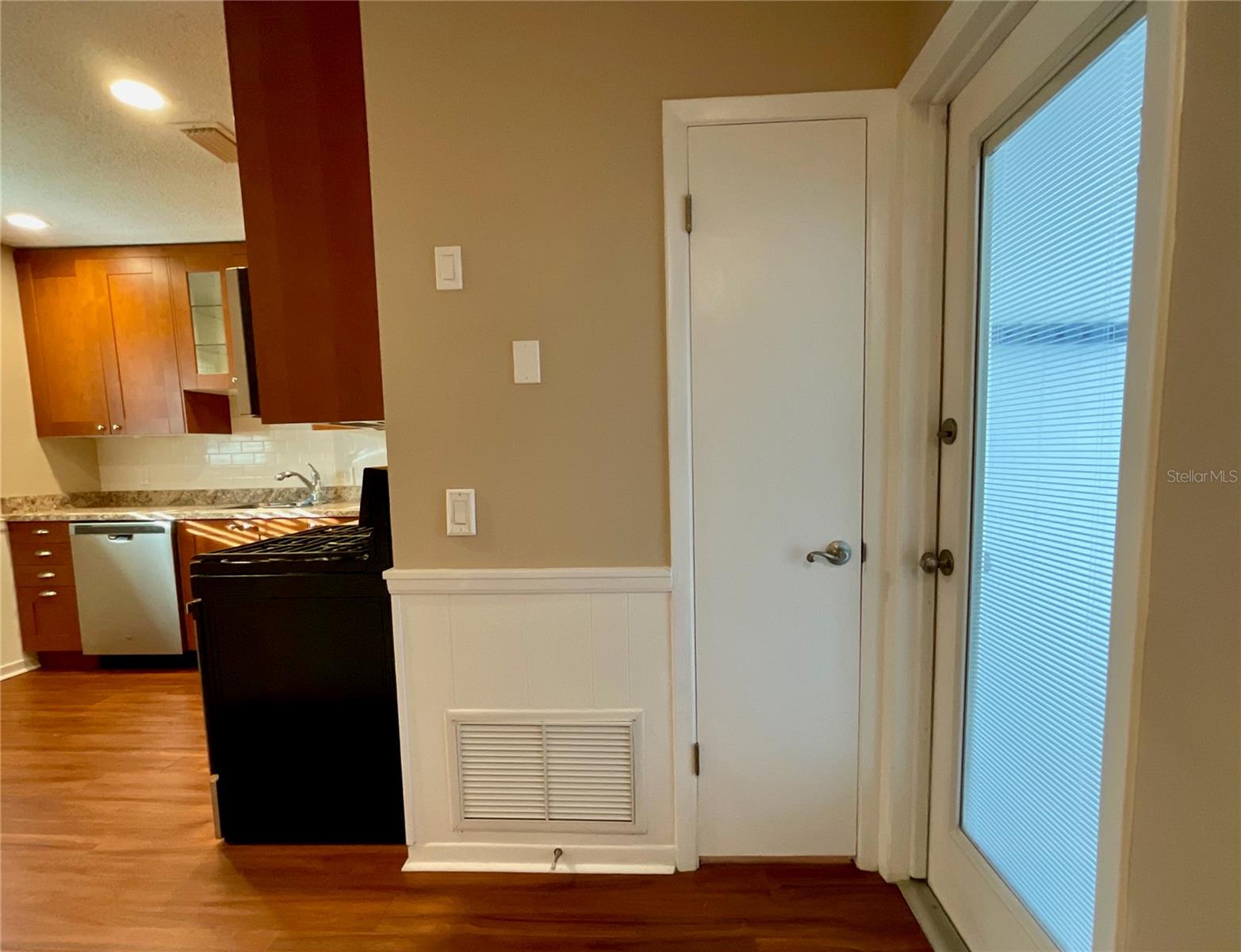 6-Hallway to kitchen, utility room and carport door