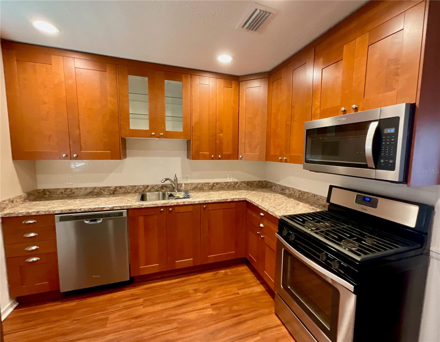 9-Kitchen cabinets and with gas stove