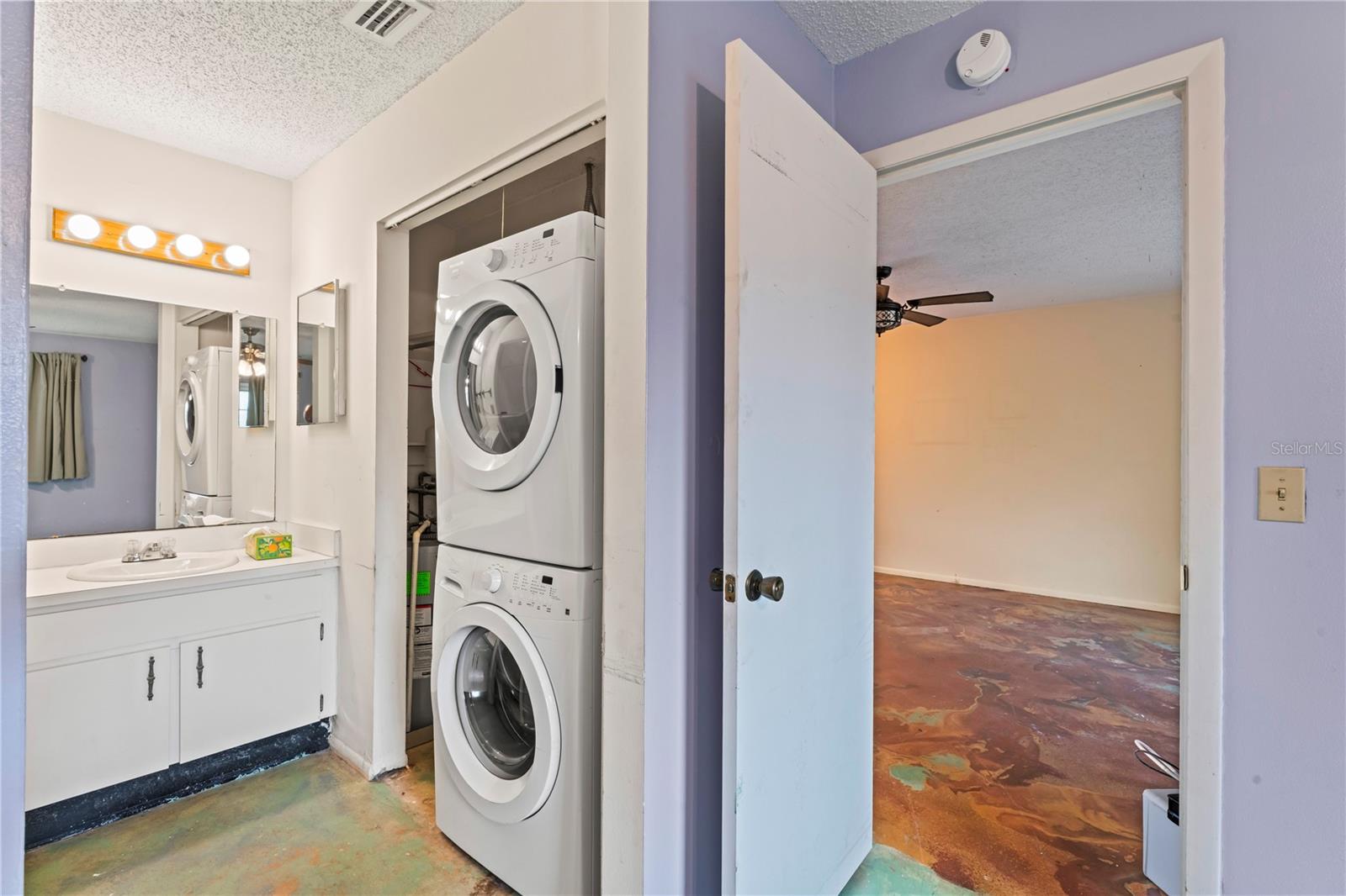 Stack Laundry next to Primary Shower