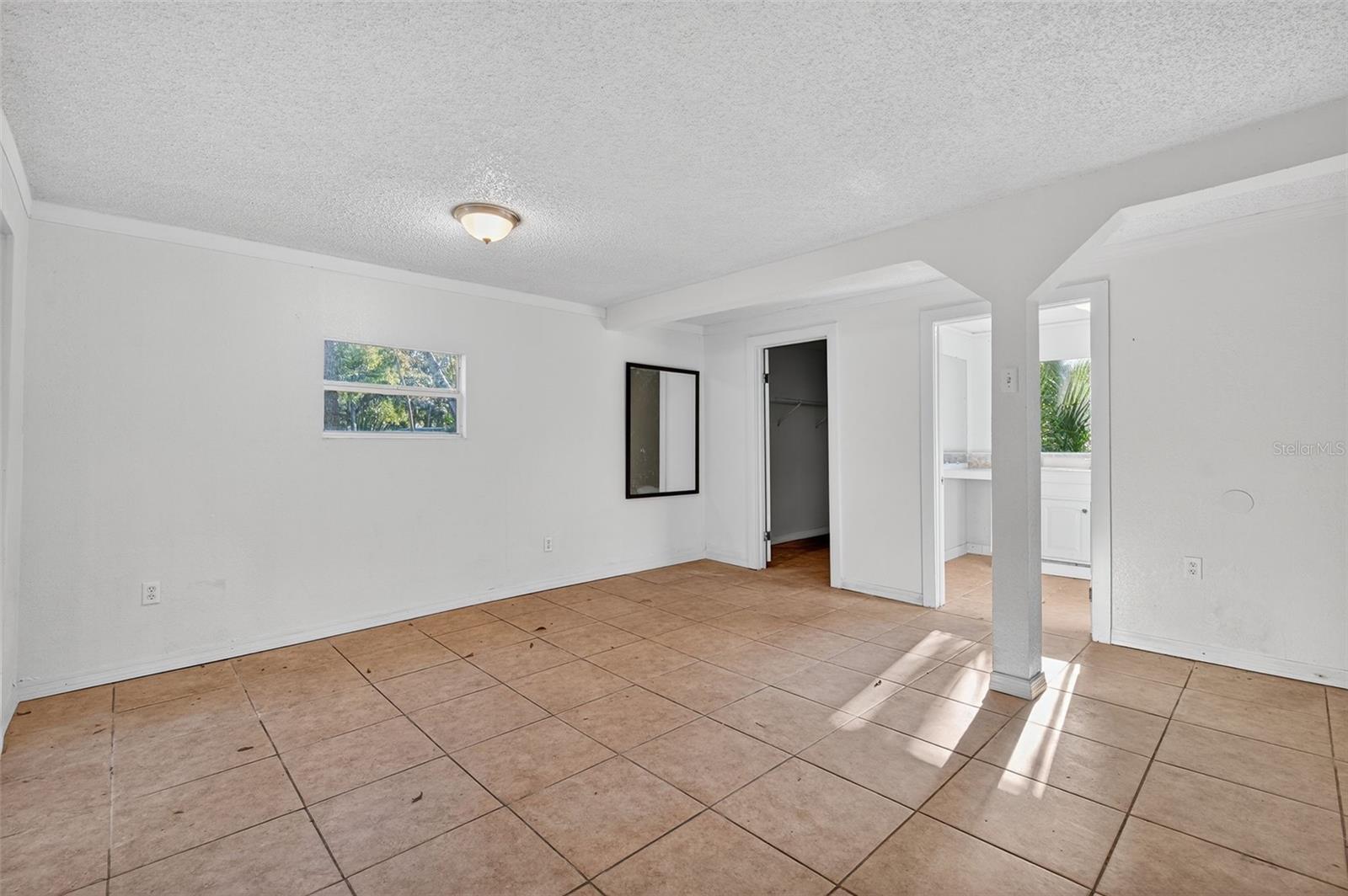 Another view of the primary bedroom.