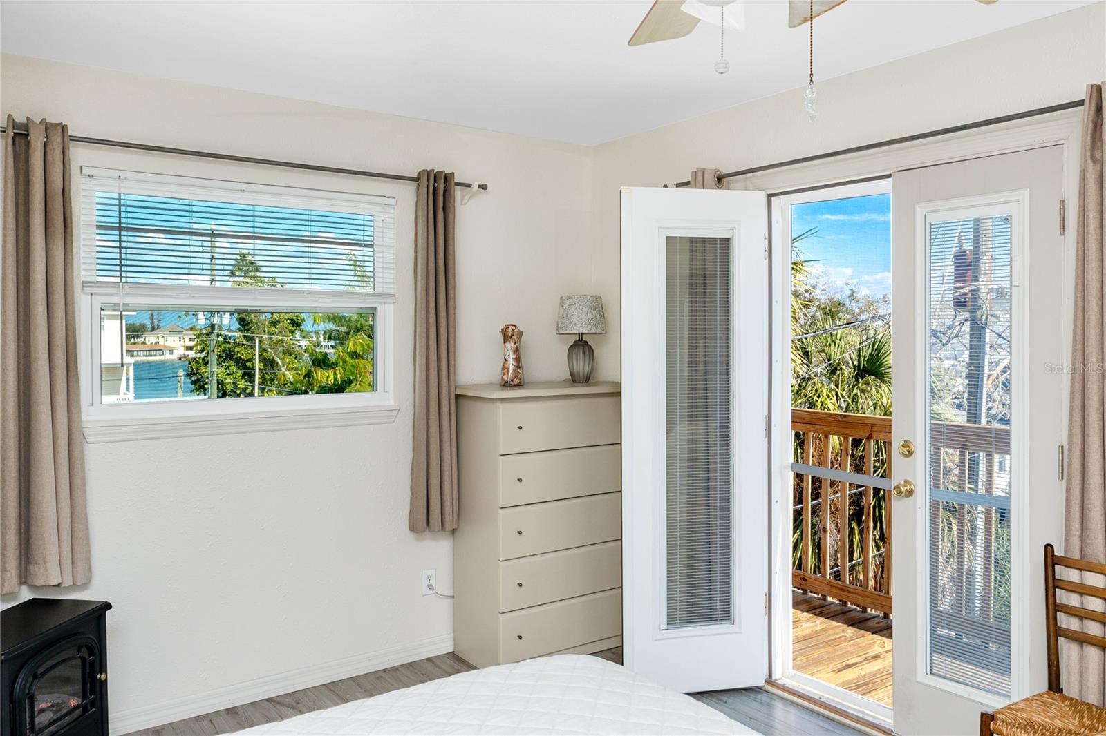 Primary Bedroom with private balcony