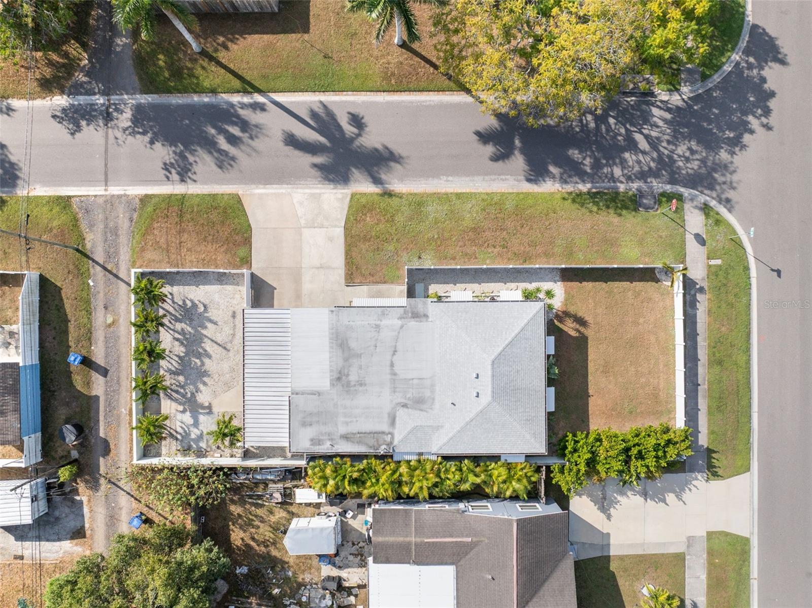 One side of house for extra parking- other side for pets, etc.