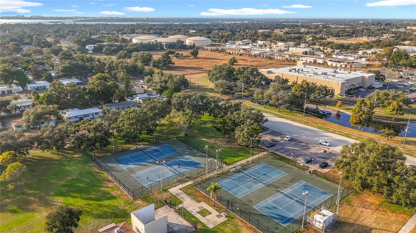 Lighted tennis courts within walking distance