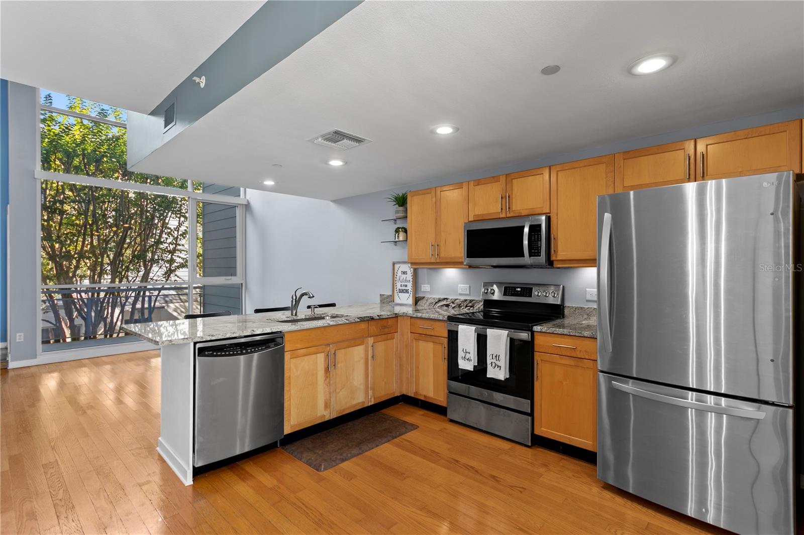 Main level (2nd) Open Concept kitchen with courtyard view
