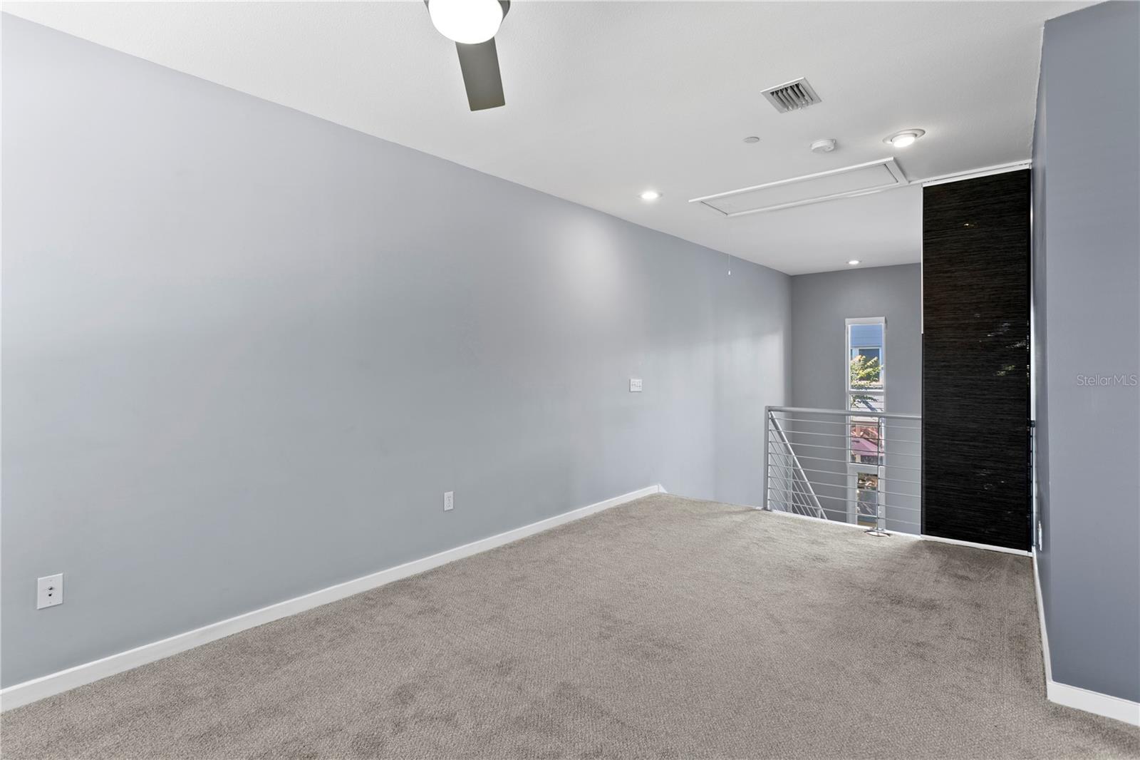 Spacious Primary Loft ensuite looking back from window