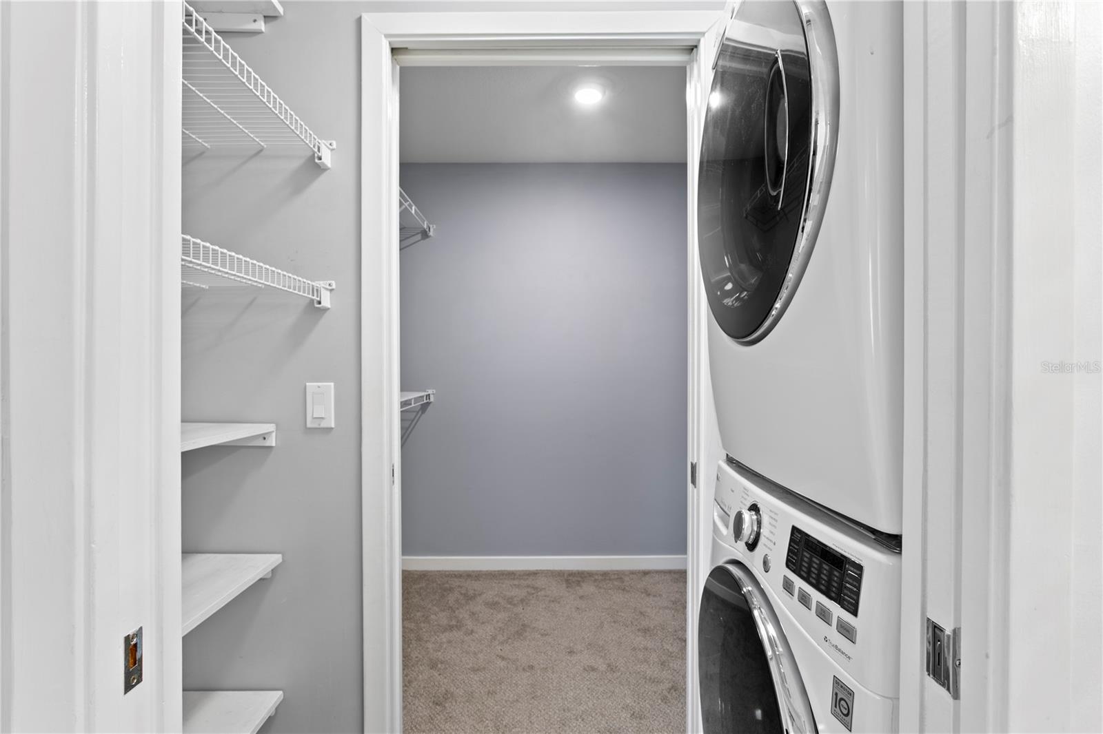 Full size washer/dryer next to Primary ensuite bath and in between walk in closet