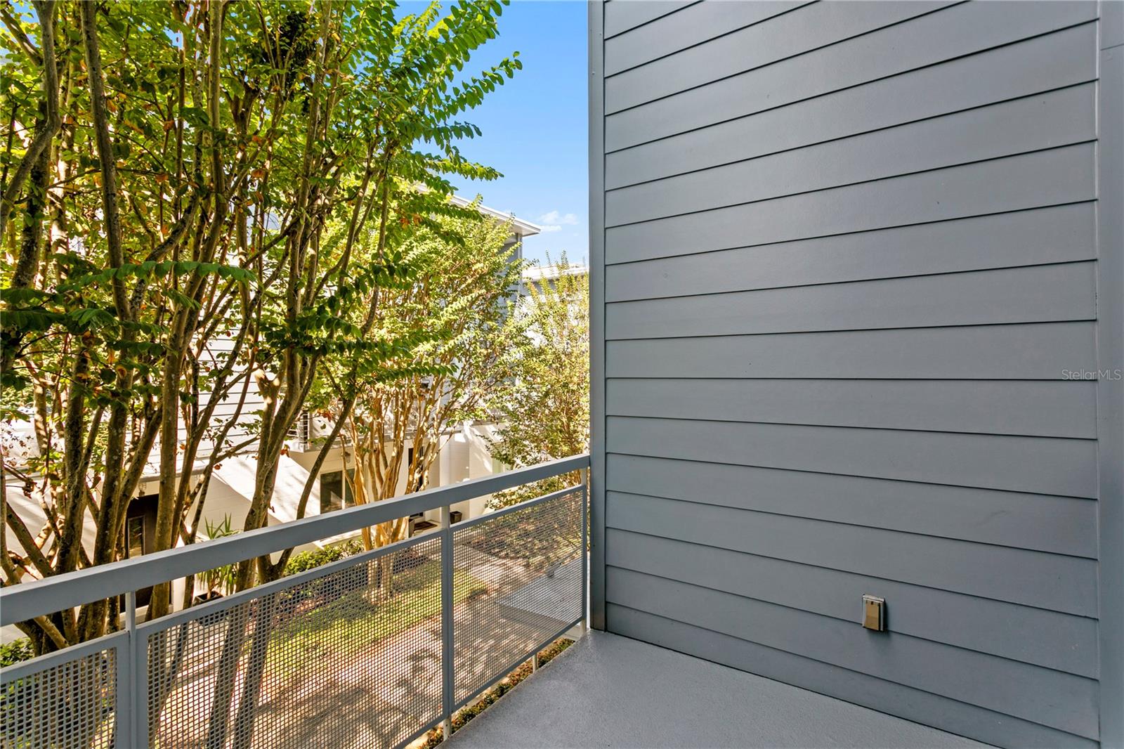 Private balcony on main level (2nd) next to Open concept living room