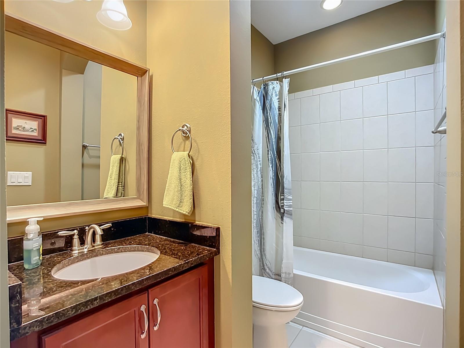 Bathroom 2 featuring tub shower