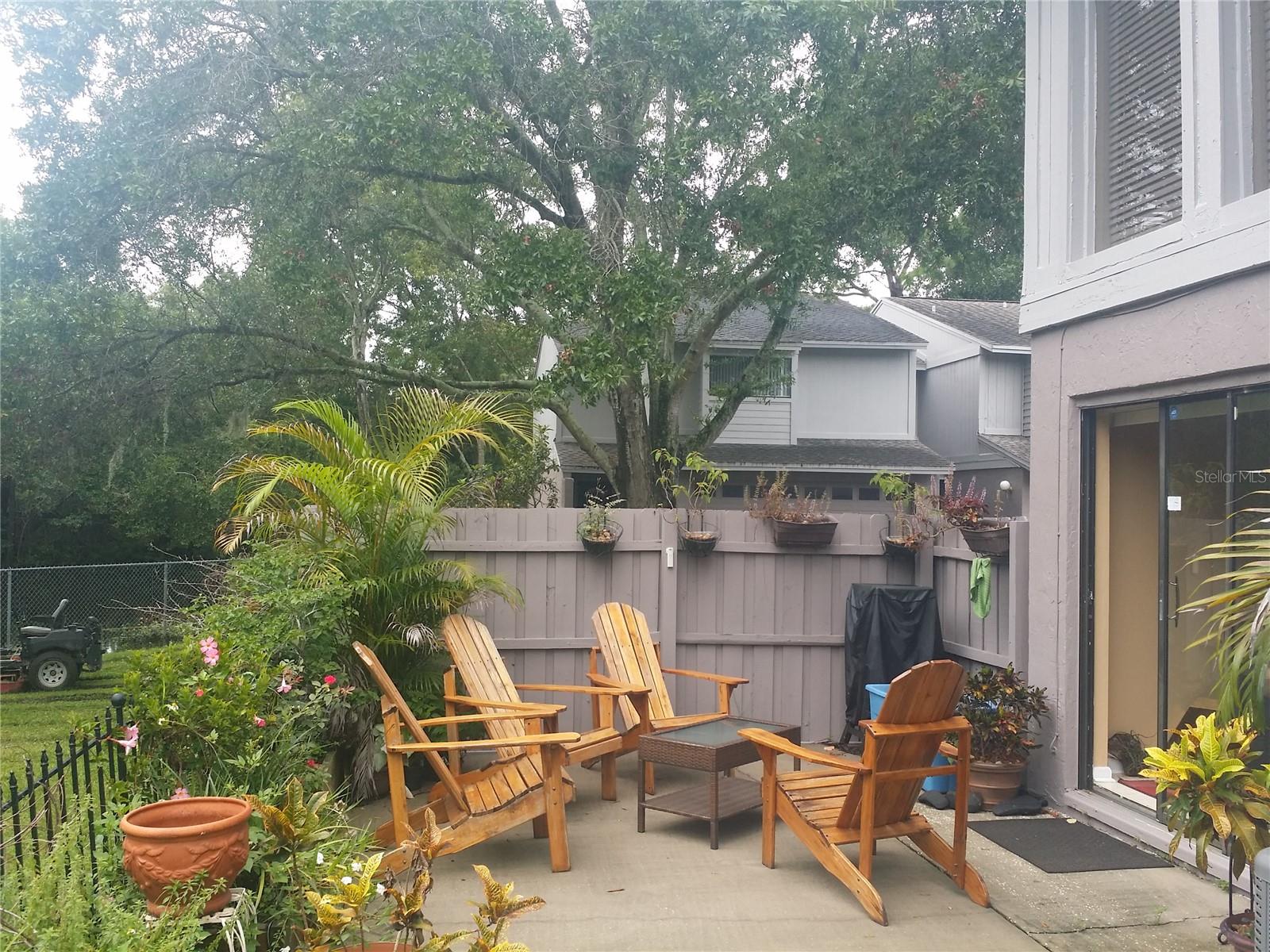 Patio has been fenced in completely with 6 ft fencing since this photo was taken