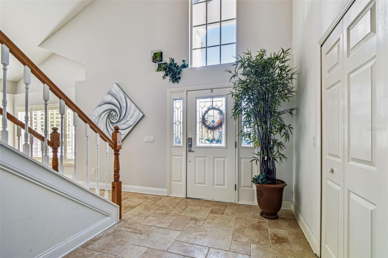 Clerestory window over entry door