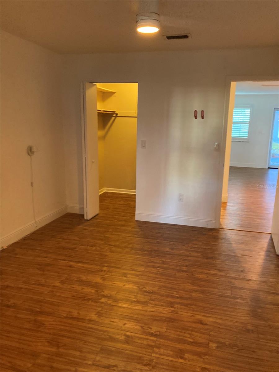 Bedroom with doorway to Florida room